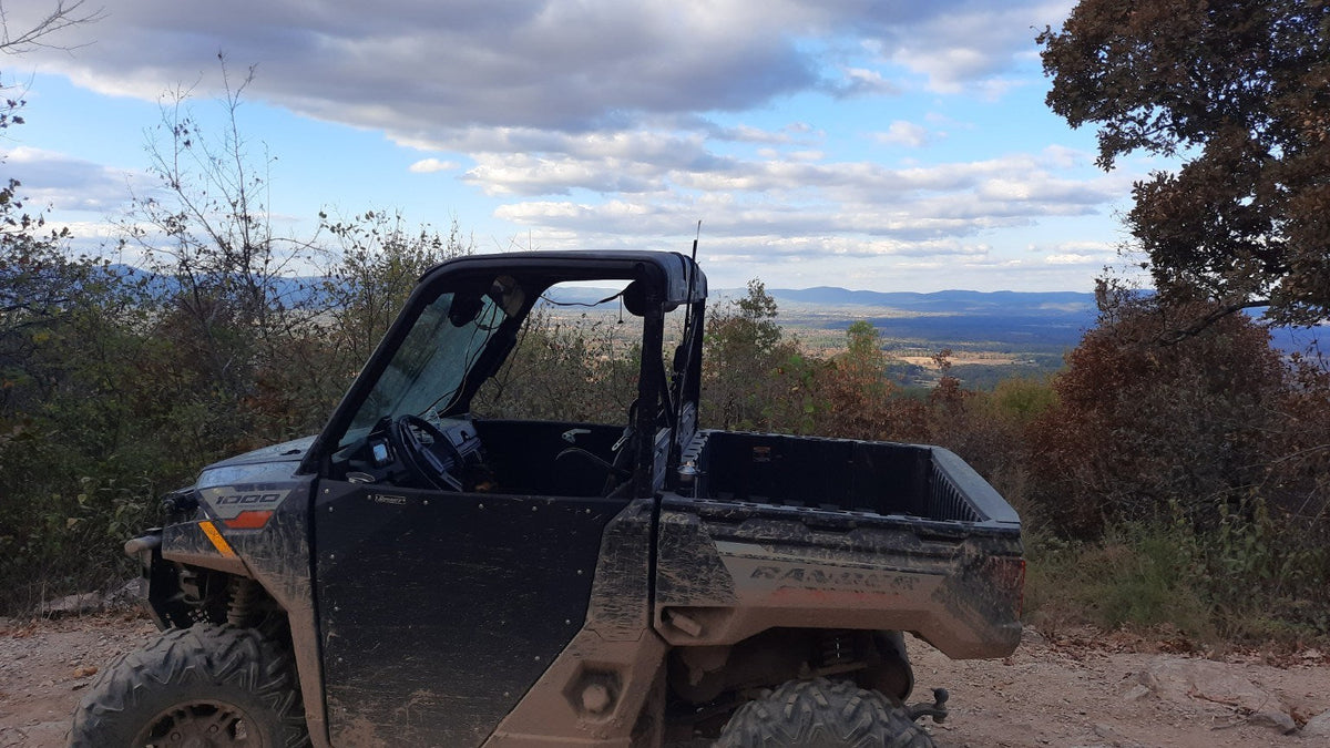Side-by-side stopped at a scenic overlook during an outdoor ride