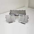 Slot Grill Compact with two solid griddle plates on top and two slotted grates in front