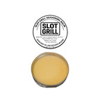 Slot Grill Seasoning Balm lid label and open tin on a white background
