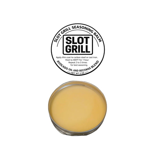 Slot Grill Seasoning Balm lid label and open tin on a white background
